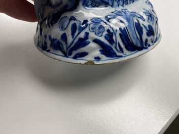 A Dutch Delft blue and white butter tub in the shape of a mermaid, 18th C.